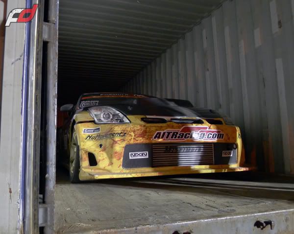 Car's getting loaded back up in containers, headed back to Long Beach