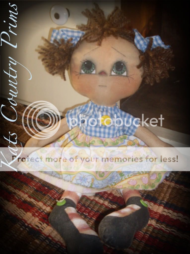   is a 14 raggedy ann style doll she is made from muslin and has